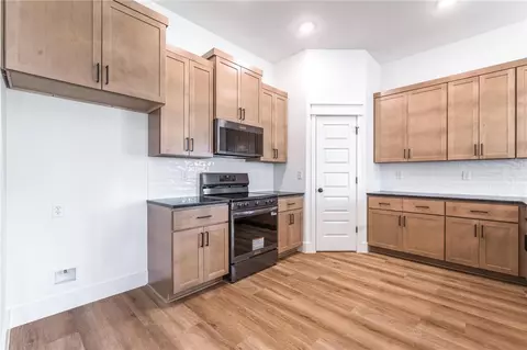 Kitchen - 1100 Ari Ave, Centerton, AR 72719 photo 3 of 7