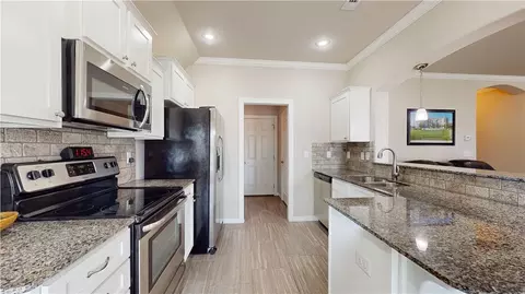 Kitchen - 761 Romano Ave, Centerton, AR 72719 photo 2 of 4