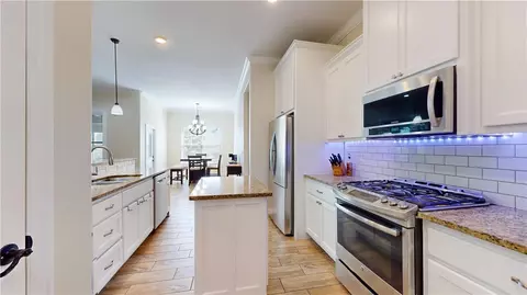 Kitchen - 751 Tamarron Dr, Centerton, AR 72719 photo 1 of 2