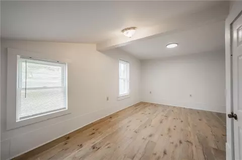 Bedroom - 121 129 Main St, West Fork, AR 72774 photo 5 of 8