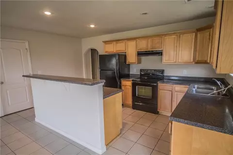Kitchen - 929-931 Kensington Dr, Centerton, AR 72719 photo 1 of 2