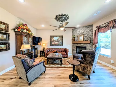 Living - 1305 Eagle Ct, Gravette, AR 72736 photo 1 of 3