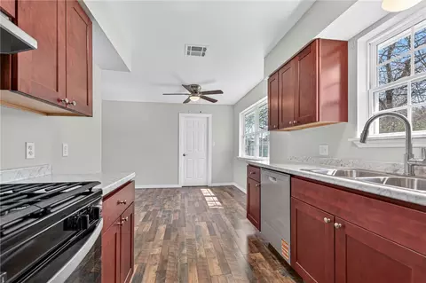 Kitchen - 513 E Adams, Midland, AR 72945 photo 1 of 2