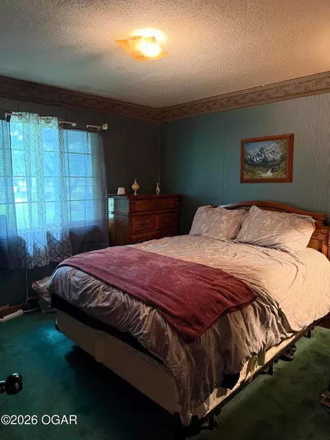 Bedroom - 300 S Holmes Ave, Wheaton, MO 64874 photo 1 of 2