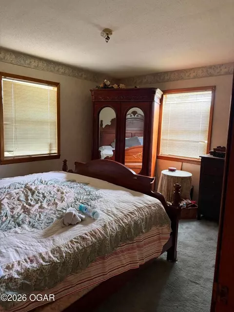 Bedroom - 300 S Holmes Ave, Wheaton, MO 64874 photo 2 of 2