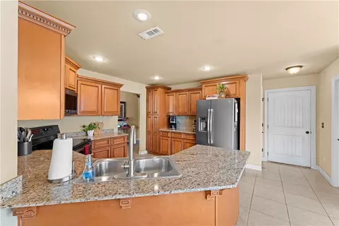 Kitchen - 208 Mcdaniel St, Lowell, AR 72745 photo 2 of 3