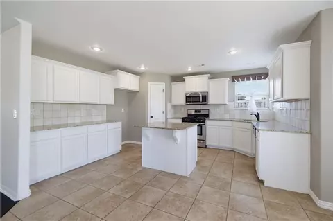 Kitchen - 1500 Aniston Rd, Centerton, AR 72719 photo 3 of 4