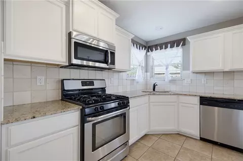 Kitchen - 1500 Aniston Rd, Centerton, AR 72719 photo 2 of 4