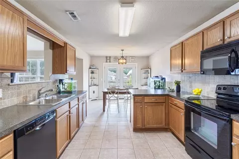 Kitchen - 606 Emerald St, Lowell, AR 72745 photo 4 of 4