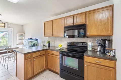 Kitchen - 606 Emerald St, Lowell, AR 72745 photo 3 of 4