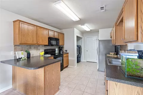 Kitchen - 606 Emerald St, Lowell, AR 72745 photo 1 of 4