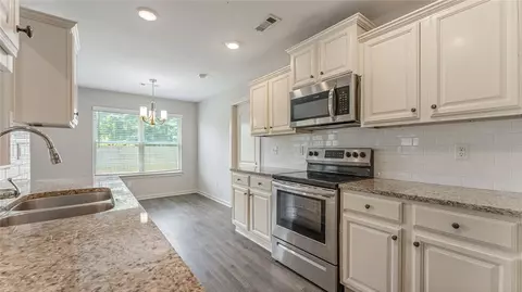 Kitchen - 519 Eagle Dr, Gravette, AR 72736 photo 5 of 7