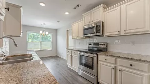 Kitchen - 519 Eagle Dr, Gravette, AR 72736 photo 5 of 6