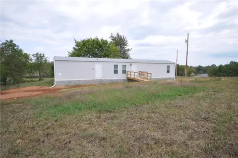 7641 Blockade Vlg N, Seligman, MO 65745 photo 13