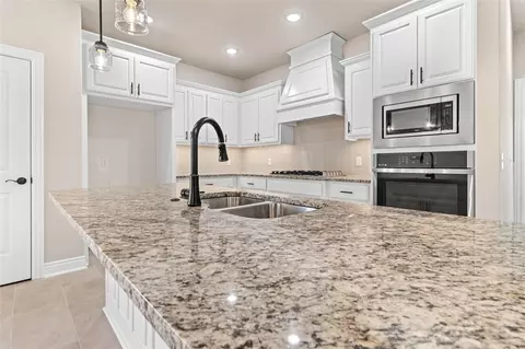 Kitchen - 413 Ryder St, Gentry, AR 72734 photo 3 of 6