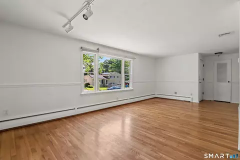 Living - 42 Carroll Rd, Hamden, CT 06517 photo 2 of 5