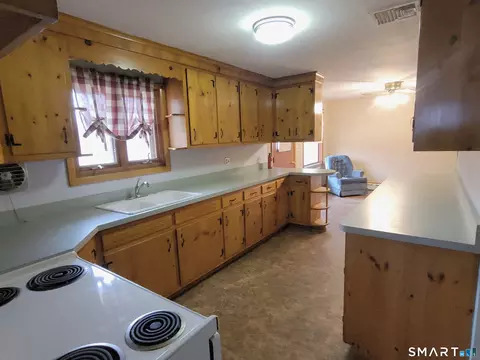 Kitchen - 30 Broad Brook Rd, Broad Brook, CT 06016 photo 2 of 2