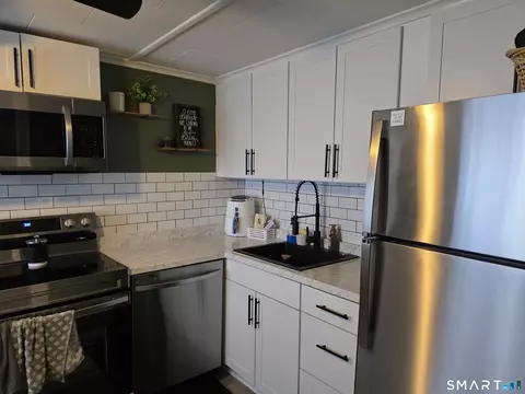 Kitchen - 23 Soule St, Griswold, CT 06351 photo 5 of 9