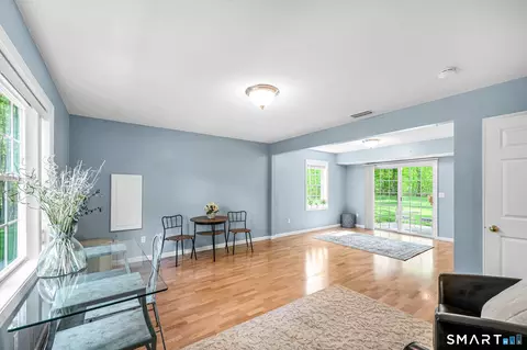 Living - 1001 Suffield St, Suffield, CT 06078 photo 4 of 5