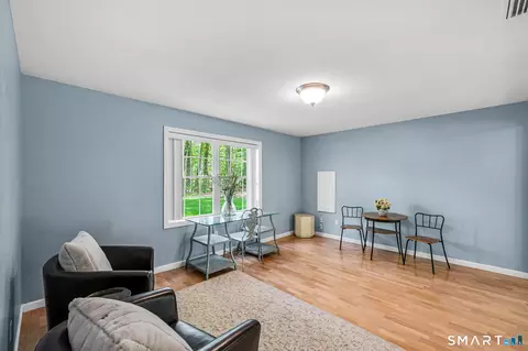 Living - 1001 Suffield St, Suffield, CT 06078 photo 3 of 5