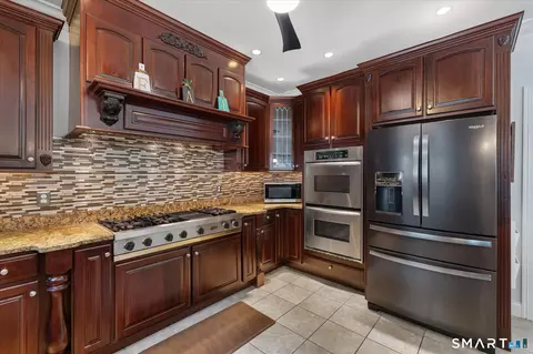 Kitchen - 56 River Rd, Killingly, CT 06241 photo 2 of 3