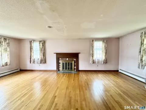 Living - 223 Spring St, Windsor Locks, CT 06096 photo 4 of 5
