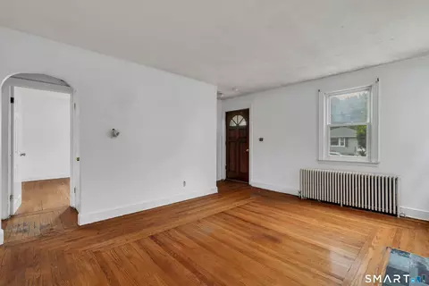 Living - 128 Church St, Hamden, CT 06514 photo 3 of 4