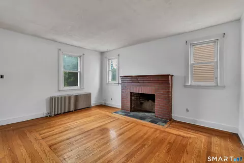 Living - 128 Church St, Hamden, CT 06514 photo 1 of 4