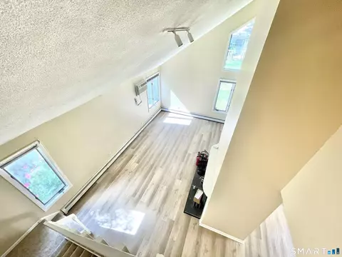 Living - 17 Yankee Glen Dr # -D, Madison, CT 06443 photo 2 of 3