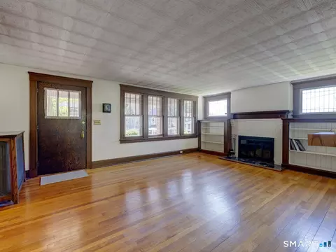 Living - 64 Chestnut St, Windham, CT 06226 photo 2 of 4