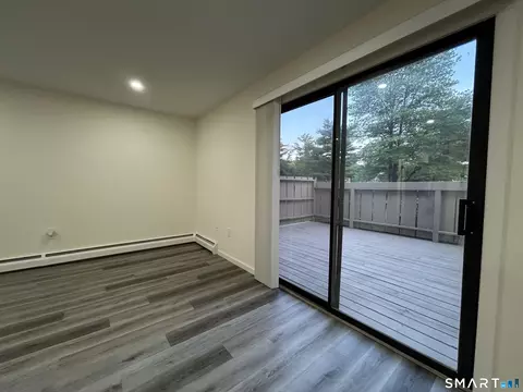 Living - 38 Sutton Pl #38, Bloomfield, CT 06002 photo 6 of 8