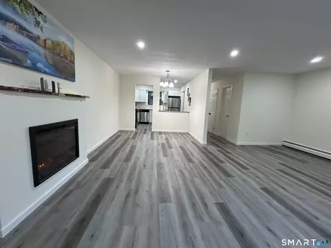 Living - 38 Sutton Pl #38, Bloomfield, CT 06002 photo 5 of 8