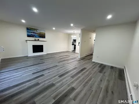 Living - 38 Sutton Pl #38, Bloomfield, CT 06002 photo 3 of 8