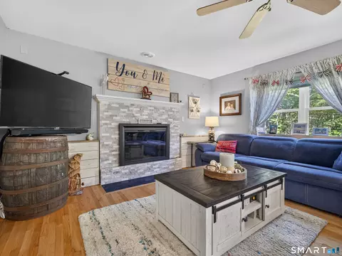 Living - 31 Martleshamheath Ln, Madison, CT 06443 photo 2 of 5