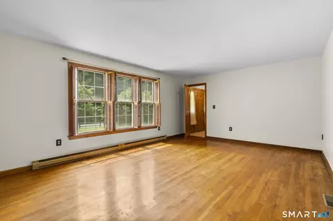 Living - 43 Robinhood Dr, Gales Ferry, CT 06335 photo 3 of 6
