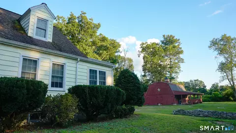 Exterior - 303 Riverside Dr, Thompson, CT 06277 photo 1 of 15