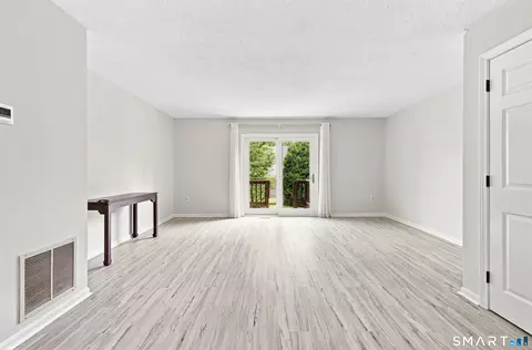 Living - 16 Braintree Ct #16, Suffield, CT 06078 photo 4 of 4