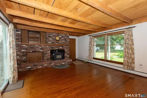Living - 447 Pumpkin Hill Rd, Ledyard, CT 06339 photo 1 of 3