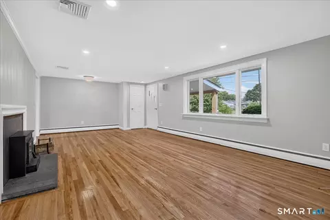 Living - 11 Derby Rd, Norwalk, CT 06854 photo 2 of 2
