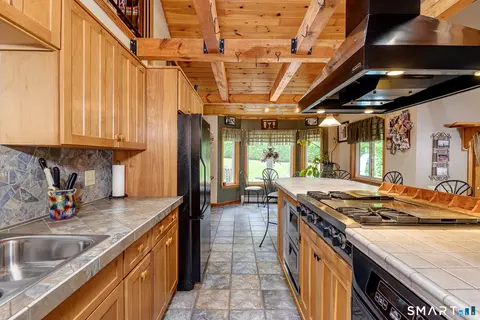 Kitchen - 126 E Putnam Rd, Putnam, CT 06260 photo 4 of 8