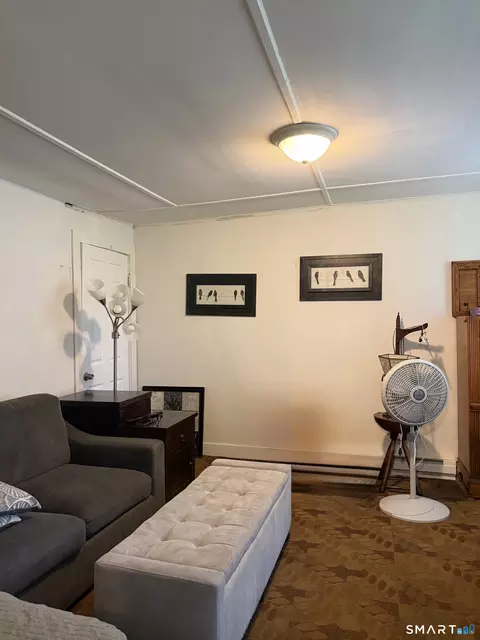 Living - 86 Chestnut St, Willimantic, CT 06226 photo 1 of 1