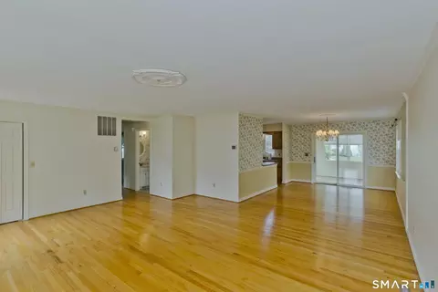 Living - 1 Strathmore Ln #1, Suffield, CT 06078 photo 1 of 6