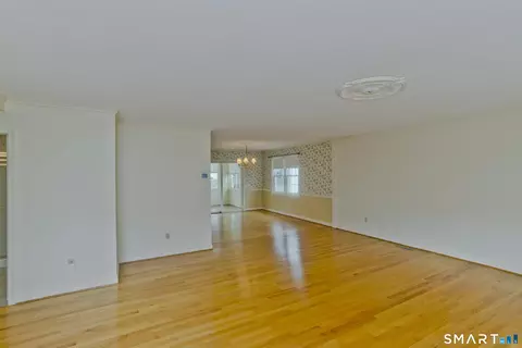 Living - 1 Strathmore Ln #1, Suffield, CT 06078 photo 2 of 6