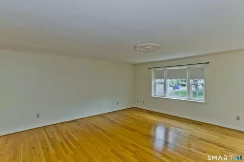 Living - 1 Strathmore Ln #1, Suffield, CT 06078 photo 4 of 6
