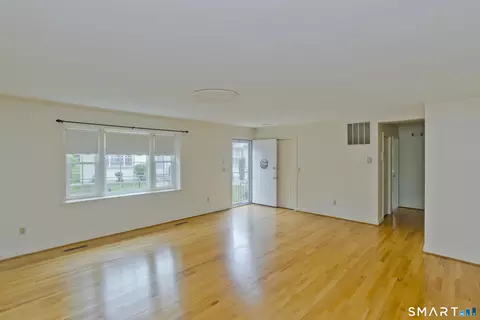 Living - 1 Strathmore Ln #1, Suffield, CT 06078 photo 3 of 6