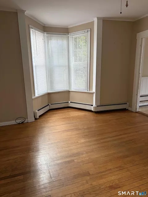 Living - 28 Pleasant St, Willimantic, CT 06226 photo 1 of 1