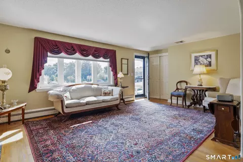 Living - 39 Clovercrest Rd, Wethersfield, CT 06109 photo 1 of 2