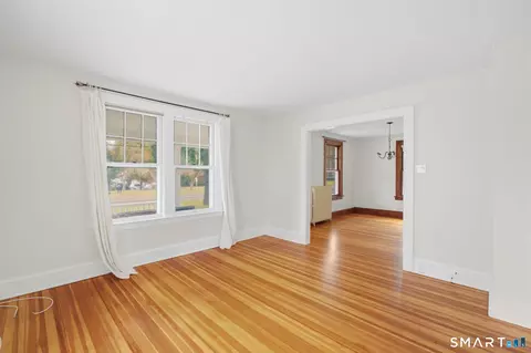 Living - 91 State St, Wethersfield, CT 06109 photo 2 of 3