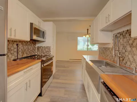 Kitchen - 56 Suffield Meadow Dr #56, Suffield, CT 06078 photo 3 of 3