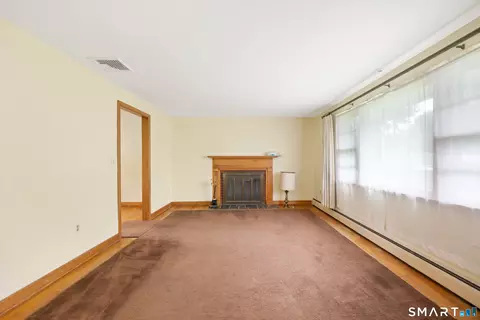 Living - 203 Fairlane Dr, Wethersfield, CT 06109 photo 1 of 4